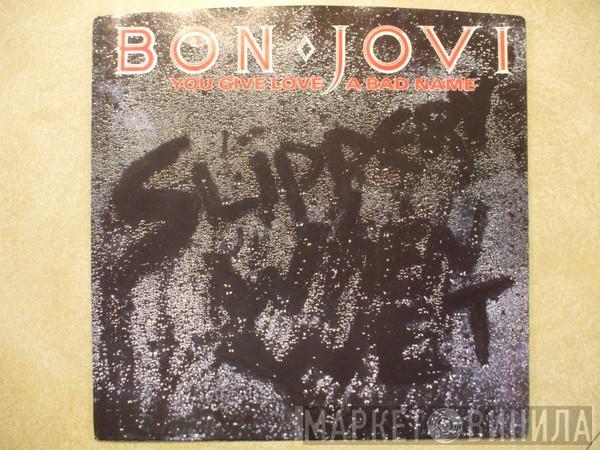  Bon Jovi  - You Give Love A Bad Name / Raise Your Hands