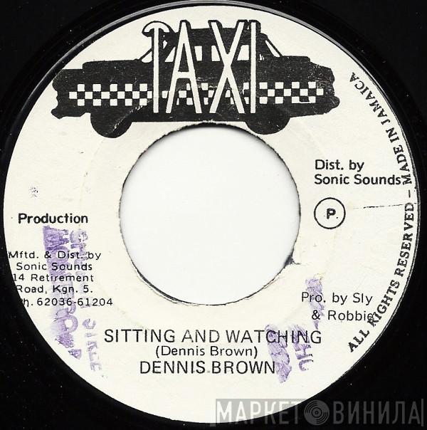  Dennis Brown  - Sitting And Watching