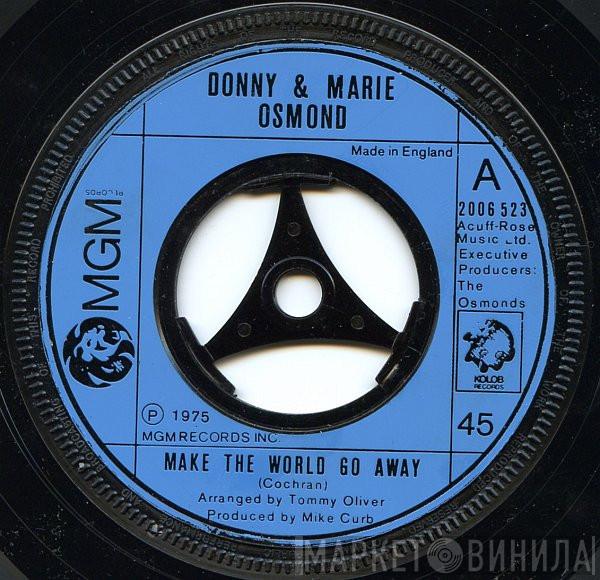  Donny & Marie Osmond  - Make The World Go Away / Living On My Suspicion