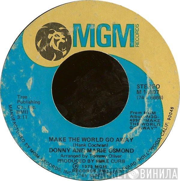  Donny & Marie Osmond  - Make The World Go Away / Living On My Suspicion