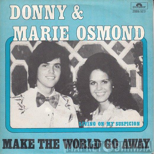  Donny & Marie Osmond  - Make The World Go Away / Living On My Suspicion