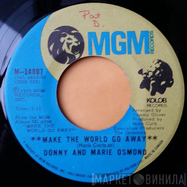  Donny & Marie Osmond  - Make The World Go Away / Living On My Suspicion
