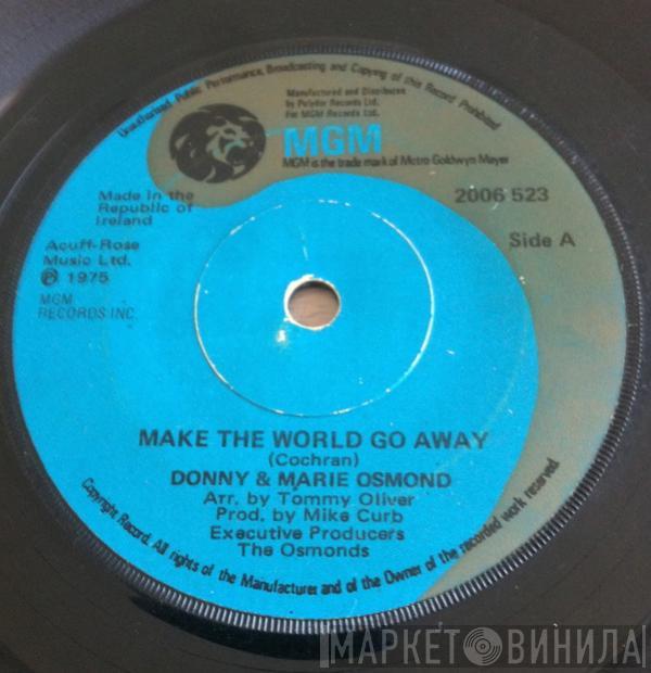  Donny & Marie Osmond  - Make The World Go Away / Living On My Suspicion