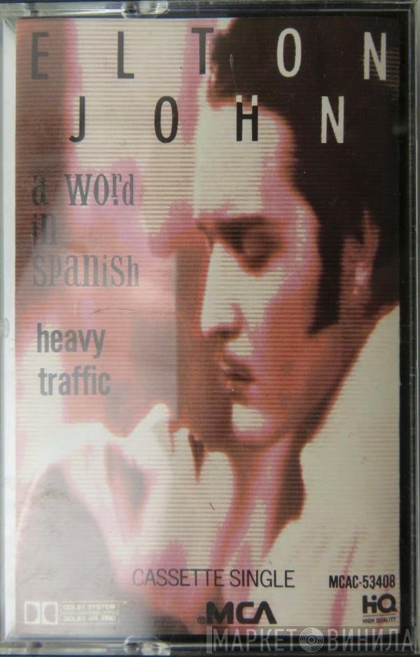  Elton John  - A Word In Spanish / Heavy Traffic