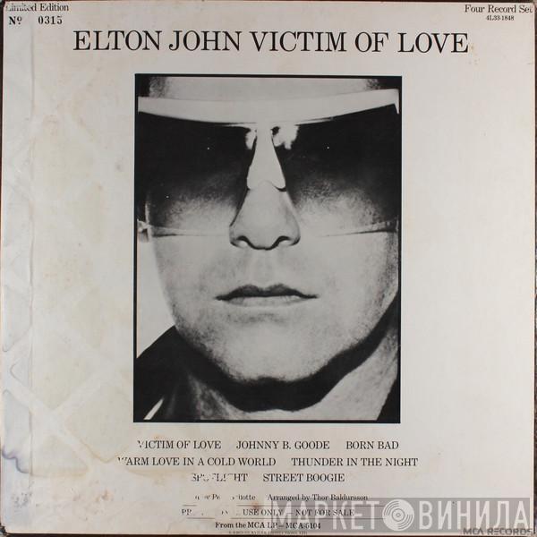  Elton John  - Victim Of Love