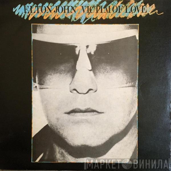  Elton John  - Victim Of Love