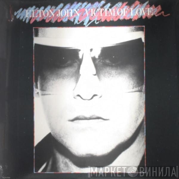 Elton John  - Victima De Amor
