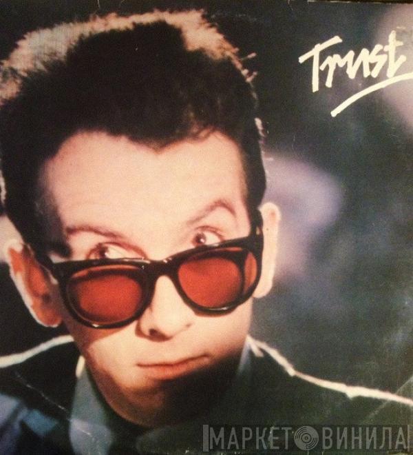  Elvis Costello & The Attractions  - Trust