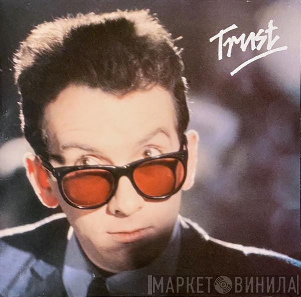  Elvis Costello & The Attractions  - Trust