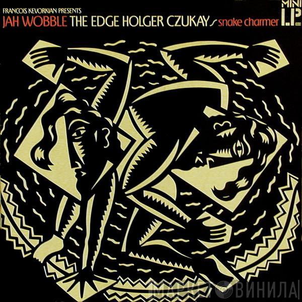 - Jah Wobble - The Edge  Holger Czukay  - Snake Charmer