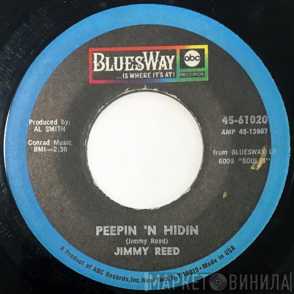  Jimmy Reed  - Peepin 'N Hidin / My Baby Told Me