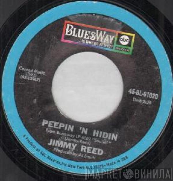  Jimmy Reed  - Peepin 'N Hidin / My Baby Told Me