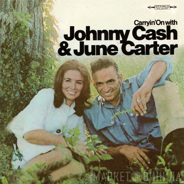  Johnny Cash & June Carter Cash  - Carryin' On With