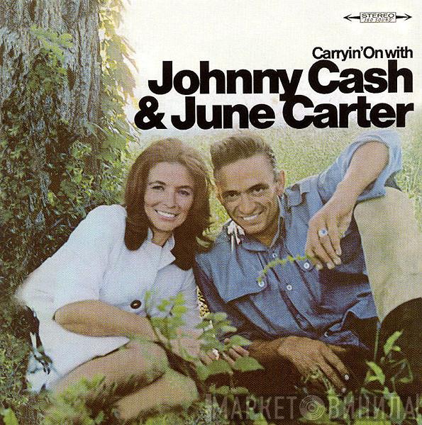  Johnny Cash & June Carter Cash  - Carryin' On With