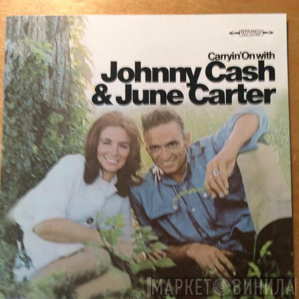  Johnny Cash & June Carter Cash  - Carryin' On With