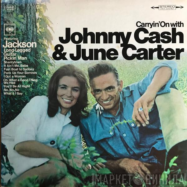  Johnny Cash & June Carter Cash  - Carryin' On With