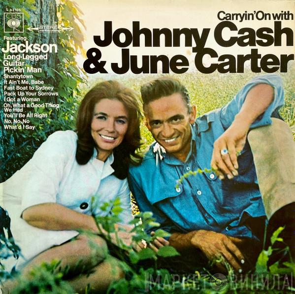  Johnny Cash & June Carter Cash  - Carryin' On With