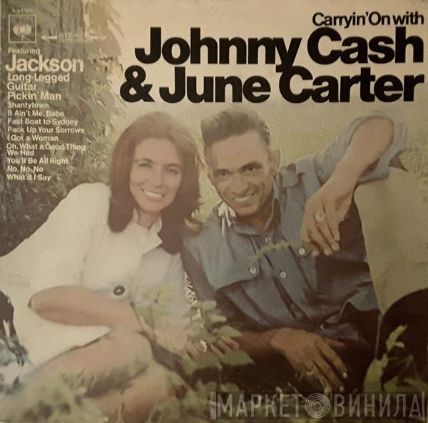  Johnny Cash & June Carter Cash  - Carryin' On With