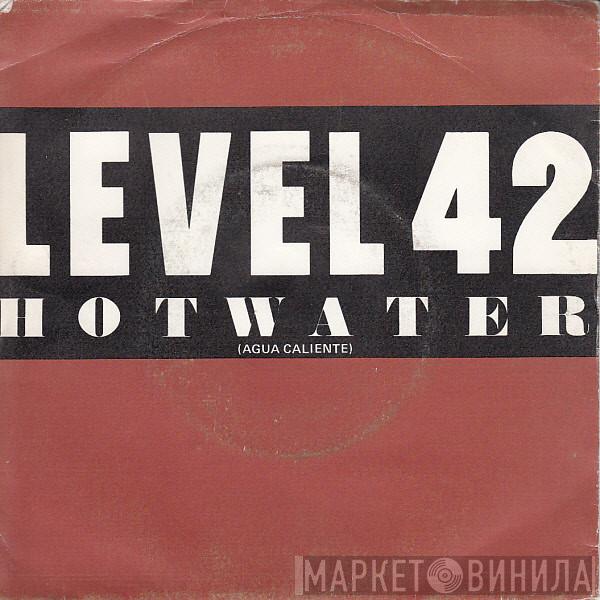 Level 42 - Hot Water = Agua Caliente