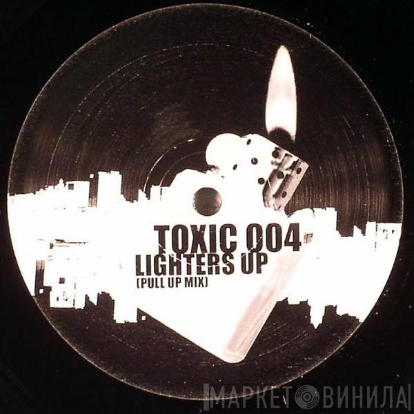  Lil' Kim  - Lighters Up (Roll Out Mix) / Lighters Up (Pull Up Mix)