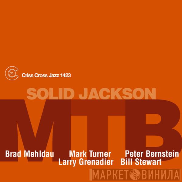 M.T.B. - Solid Jackson