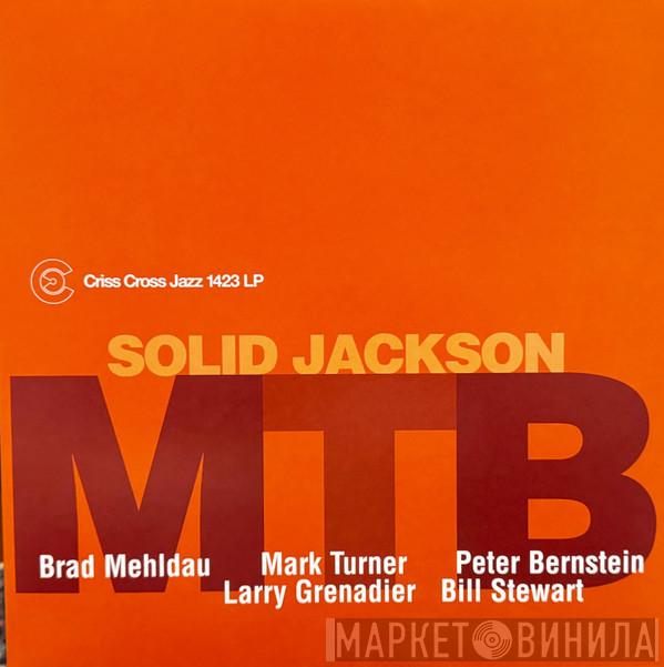 M.T.B. - Solid Jackson
