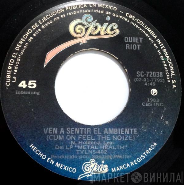  Quiet Riot  - Ven A Sentir El Ambiente = Cum On Feel The Noize