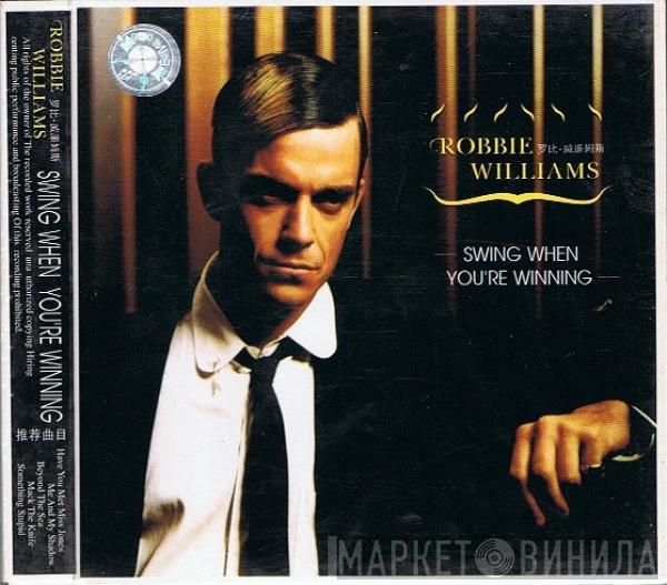  Robbie Williams  - Swing When You're Winning