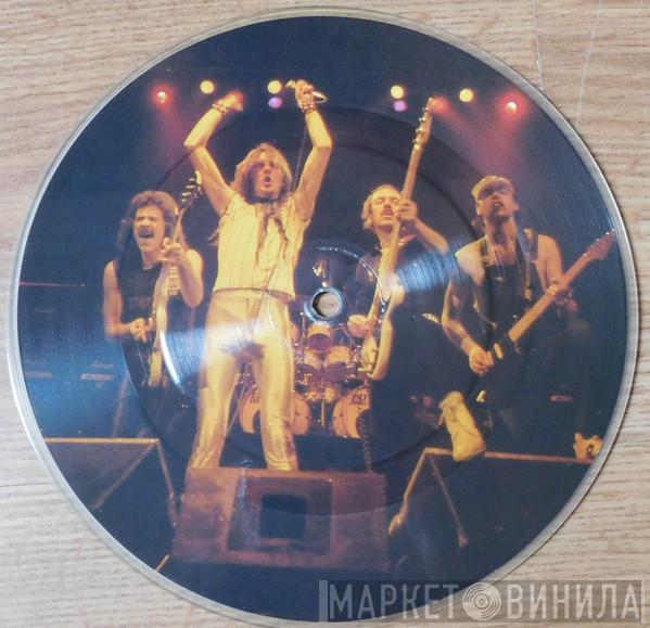 Saxon - And The Bands Played On