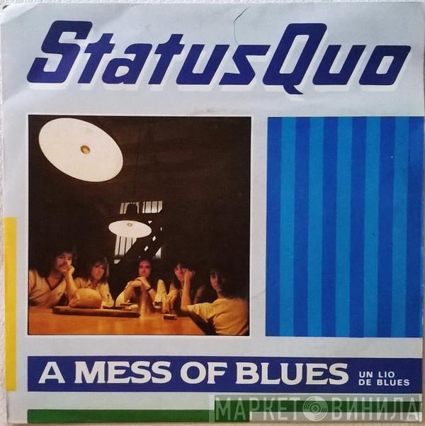  Status Quo  - A Mess Of Blues = Un Lio De Blues