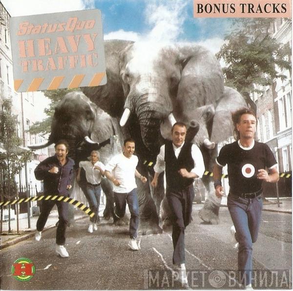  Status Quo  - Heavy Traffic + Bonus tracks