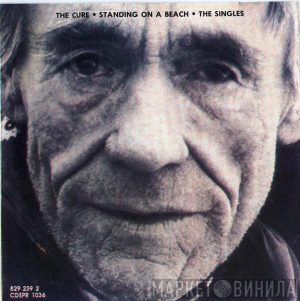  The Cure  - Standing On A Beach • The Singles