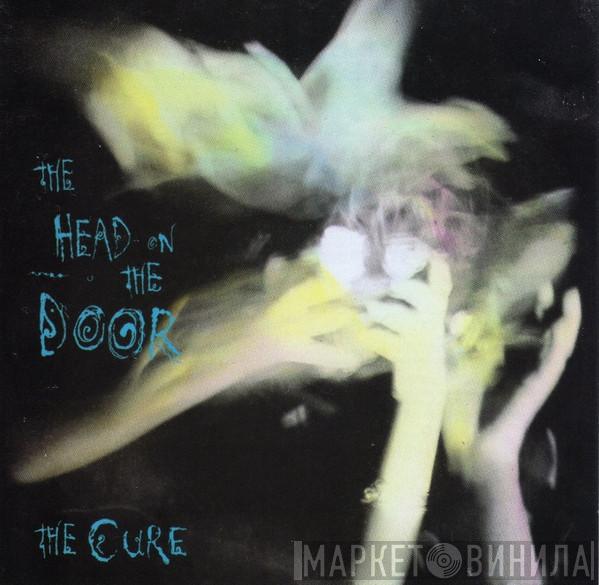  The Cure  - The Head On The Door