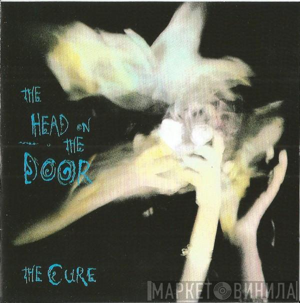  The Cure  - The Head On The Door