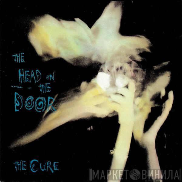  The Cure  - The Head On The Door
