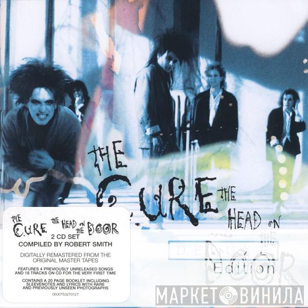 The Cure  - The Head On The Door