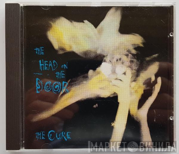  The Cure  - The Head On The Door