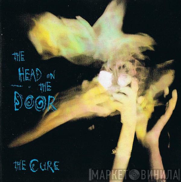  The Cure  - The Head On The Door
