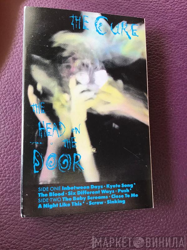  The Cure  - The Head On The Door