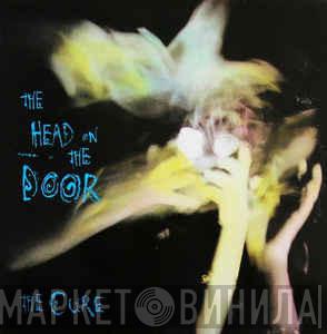  The Cure  - The Head On The Door