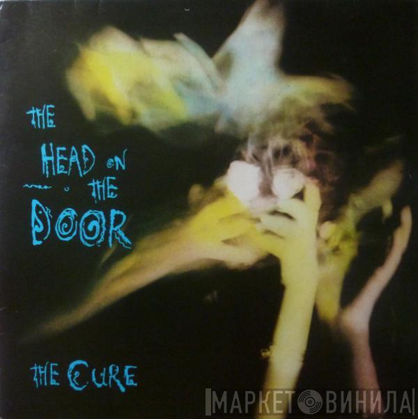  The Cure  - The Head On The Door