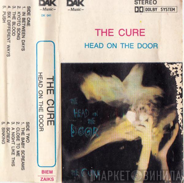  The Cure  - The Head On The Door
