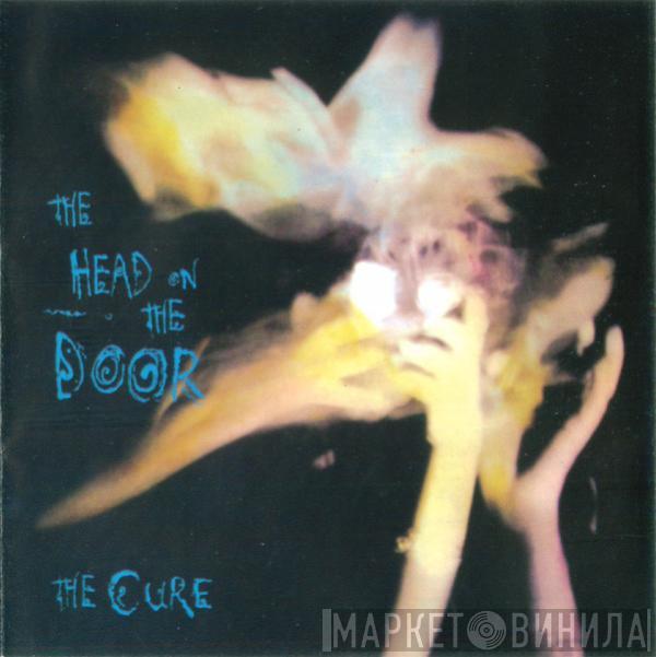  The Cure  - The Head On The Door