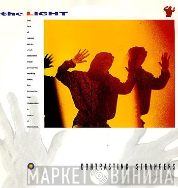 The Light  - Contrasting Strangers