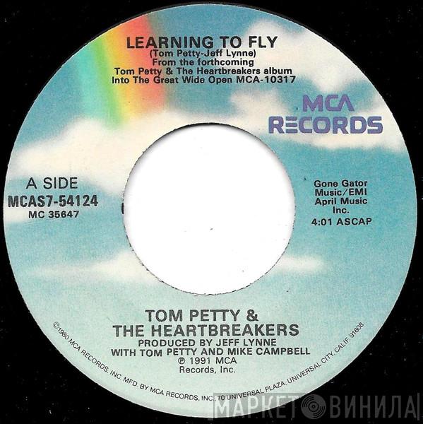  Tom Petty And The Heartbreakers  - Learning To Fly