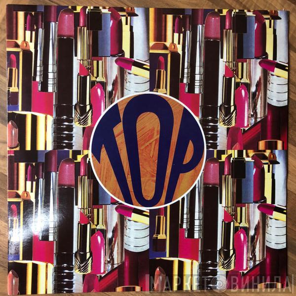 Top - She's Got All The World