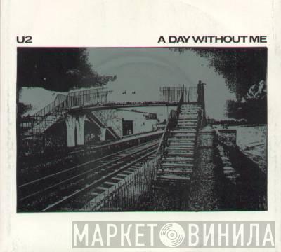  U2  - A Day Without Me
