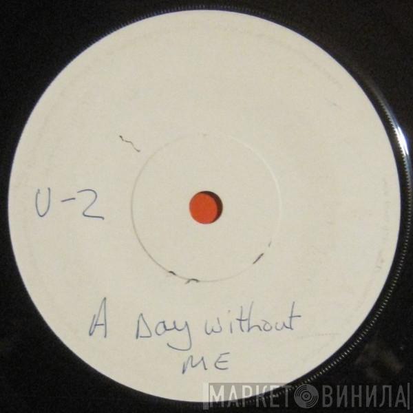  U2  - A Day Without Me