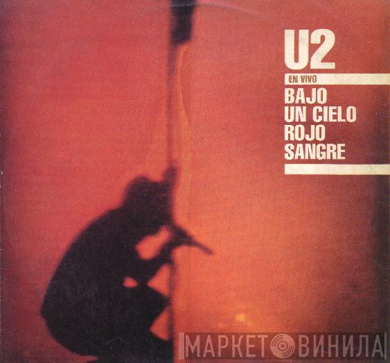  U2  - Bajo Un Cielo Rojo Sangre (En Vivo)
