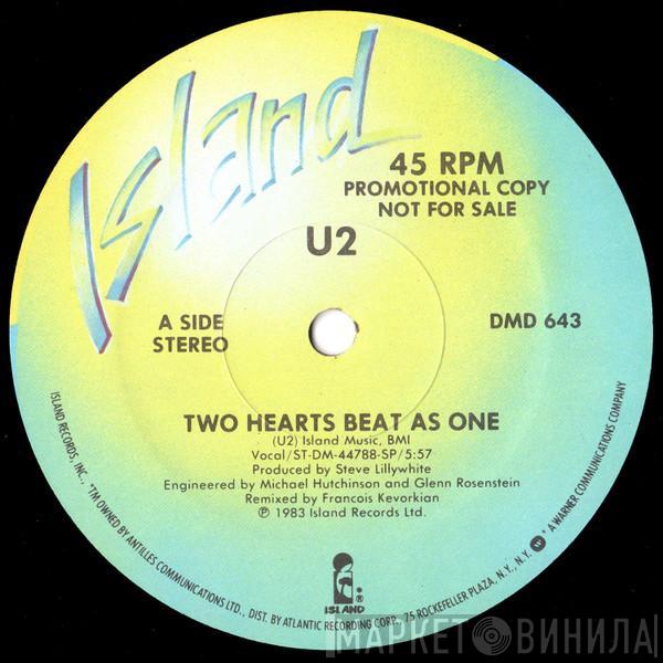  U2  - Two Hearts Beat As One